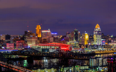 Cincinnati, Ohio USA - February 12, 2022: Panoramic View of the Cincinnati Skyline Lit Up in Orange in Honor of the Cincinnati Bengals NFL team having made it to the Superbowl