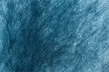 Scratched blue and white background.