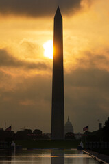 Fototapeta na wymiar Washington monument silhouette during sunrise - Washington DC United States