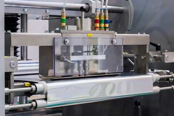 Conveyor Belt Food.Factory for the production of food. Production line with packaging. Food products  in plastic packaging on the conveyor. food production concept