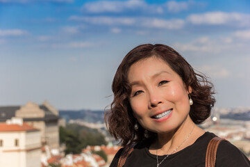 Attractive middle-aged asian woman with dark hair