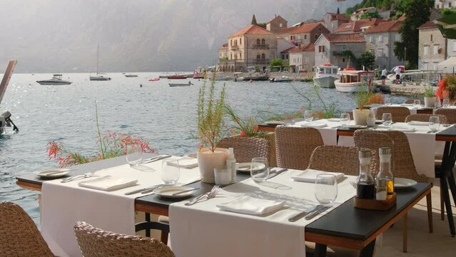 Outdoor restaurant in Perast village in Kotor Bay, Montenegro.