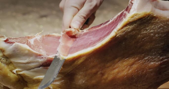 Cut juicy appetizing jamon, close-up
