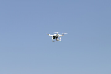 Fototapeta na wymiar Flying drone above the cereals. concept drone survey in agriculture.