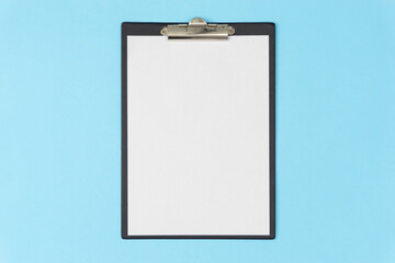 A tablet with a blank page on a blue background. Medical diagnosis or a mock-up of a doctor's prescription.