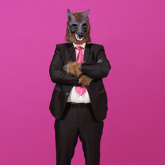 A well dressed werewolf with its arms crossed