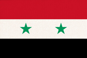 Flag of Syria. Syrian flag on fabric texture. National symbol of Syria