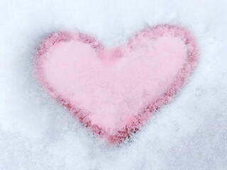 Fototapeta premium pink valentine drawn on white snow