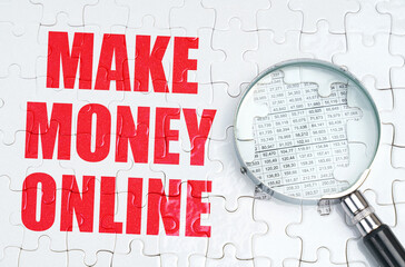 There is a magnifying glass on the puzzles, next to it is written - MAKE MONEY ONLINE