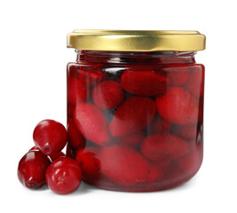 Delicious dogwood jam with berries on white background
