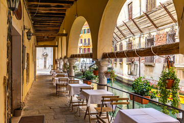 Cafe by the canal in Venice, Italy © Wieslaw
