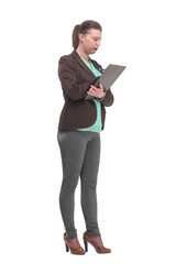 Isolated studio shot of a caucasian businesswoman taking notes on a clipboard