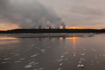 Winter power plant at sunset