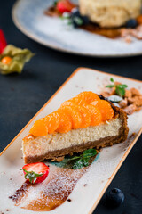 vegan healthy cheese cake dessert with tangerine