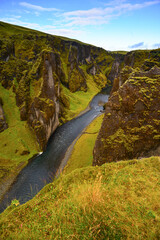 The popular and green Fjaðrárgljúfur canyon, near Kirkjubæjarklaustur village, South Coast of...