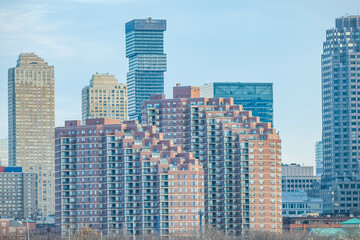 Fototapeta na wymiar New Jersey City skyline, modern buildings architecture, perfect day, close up.