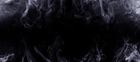 Panoramic view of the abstract fog. White cloudiness, mist or smog moves on black background. Beautiful swirling gray smoke. Mockup for your logo. Wide angle horizontal wallpaper or web banner.