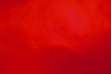 Red metallic reflective material glowing surface