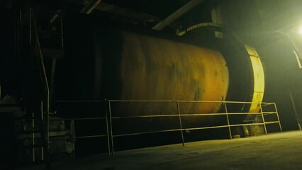 Turning Stainless Steel Coal Ball Mill. Rotation Energy Ball Mill for Grinding Coal. Industrial Horizontal Crushing Impacting Grinding Coal Processing Ball Mill Milling grinding Machine, in spin.