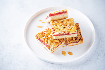 Sweet shortbread cookies with berry jam in a plate