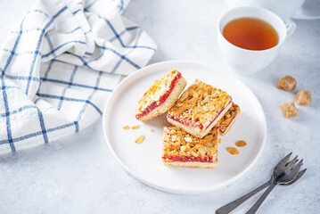 Sweet shortbread cookies with berry jam in a plate