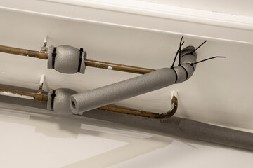 The pipelines connections in the insulation.