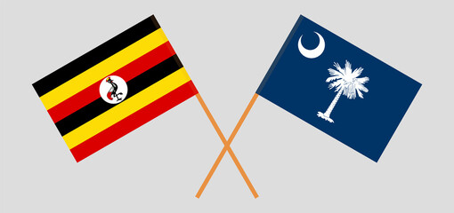 Crossed flags of Uganda and The State of South Carolina. Official colors. Correct proportion