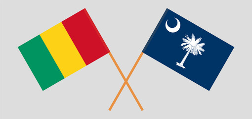 Crossed flags of Guinea and The State of South Carolina. Official colors. Correct proportion