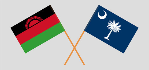 Crossed flags of Malawi and The State of South Carolina. Official colors. Correct proportion