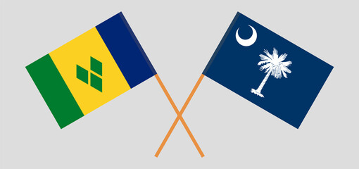Crossed flags of Saint Vincent and the Grenadines and The State of South Carolina. Official colors. Correct proportion