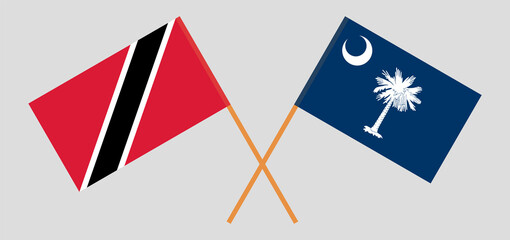 Crossed flags of Trinidad and Tobago and The State of South Carolina. Official colors. Correct proportion