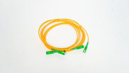 Fiber optic cables isolated on white background.Yellow optic cable with connectors. Fiber optic connectors on the white background.