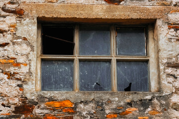 Old window with broken glass