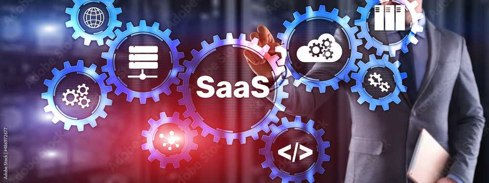 Poster saas software as a service concept with hand pressing text