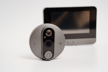 electronic door peephole with call button and screen on a white background. 