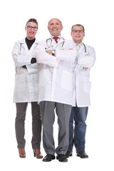 Team of doctors standing arms crossed and smiling at camera