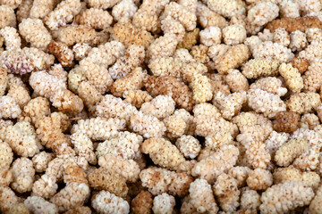 Dried mulberry fruits background and texture,top view