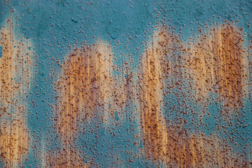 a blue wall with a orange rust texture at Mud Island Park in Memphis Tennessee USA