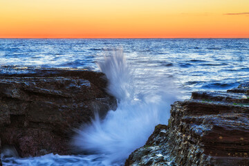 Fototapeta premium Sea Narrab red trench splash close