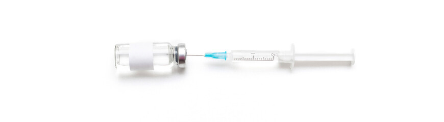 Bottle with liquid vaccine with medical syringe close up, developed for protection against infection, virus. Prevention disease with vaccination injection treatment