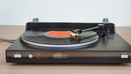 Turntable on the table. Music on vinyl record.