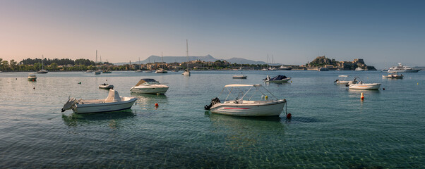 Panoramic view of yachts and sailboats in the bay. Corfu Greece with the old fortress in the background
