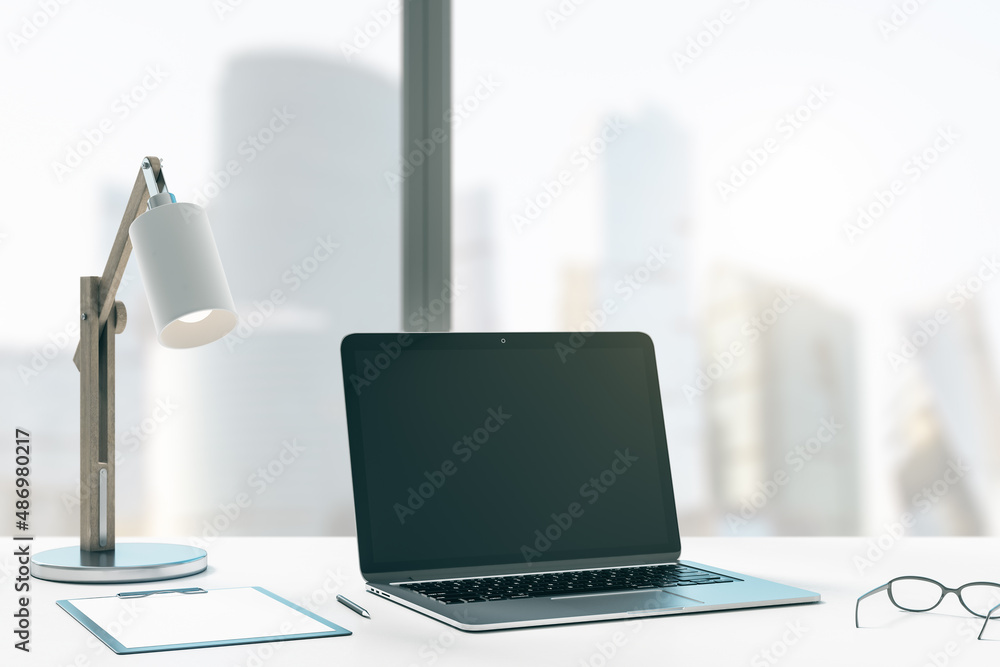 Poster close up of creative designer office desktop with mock up place on black laptop computer screen, tab