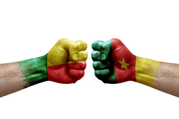 Two hands punch to each others on white background. Country flags painted fists, conflict crisis...