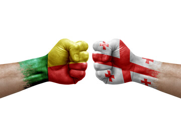 Two hands punch to each others on white background. Country flags painted fists, conflict crisis...