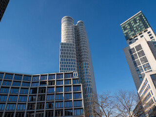 Obraz premium Tall buildings against the blue sky.