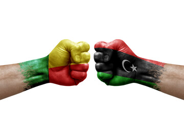 Two hands punch to each others on white background. Country flags painted fists, conflict crisis...