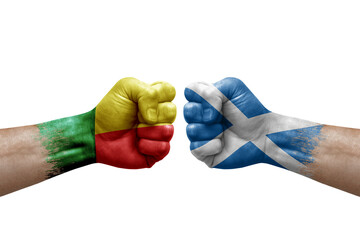 Two hands punch to each others on white background. Country flags painted fists, conflict crisis...