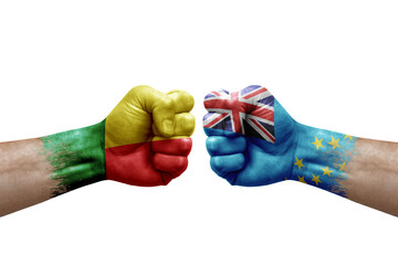 Two hands punch to each others on white background. Country flags painted fists, conflict crisis...