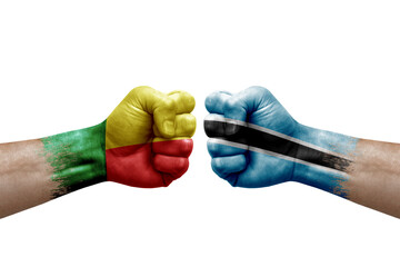 Two hands punch to each others on white background. Country flags painted fists, conflict crisis...